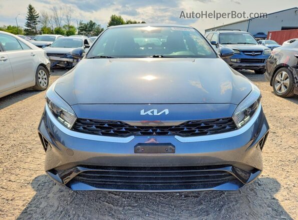 3KPF34AD0PE710219 2023 KIA FORTE Серый Вид спереди