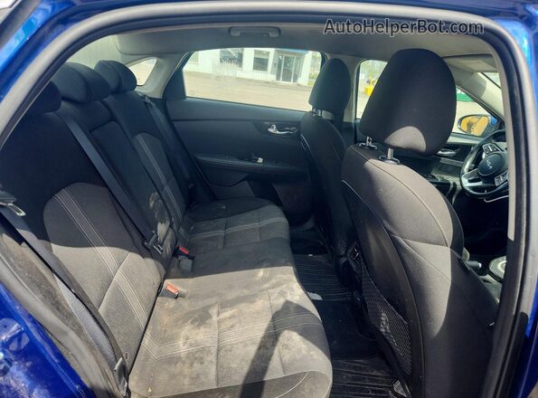 3KPF34AD6PE556325 2023 KIA FORTE Blue Rear seats view
