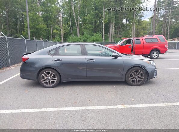 3KPF34AD7KE028897 2019 KIA FORTE Gray Vista interior trasera