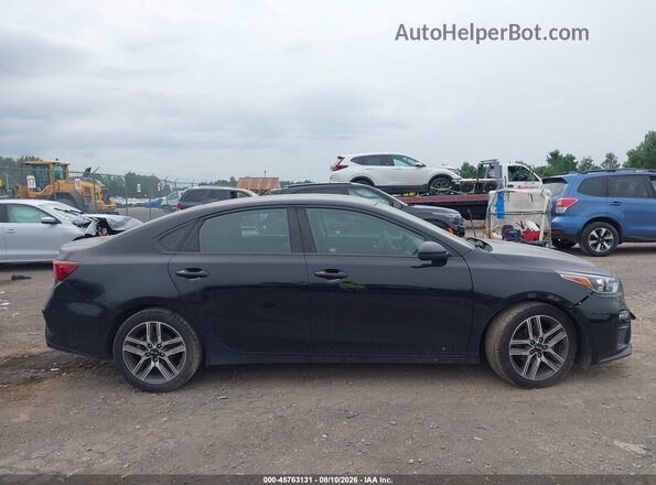 3KPF34AD8KE015690 2019 KIA FORTE Black Rear interior view
