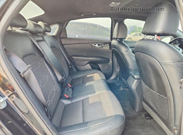 3KPF34AD8ME309755 2021 KIA FORTE Black Vista de los asientos traseros