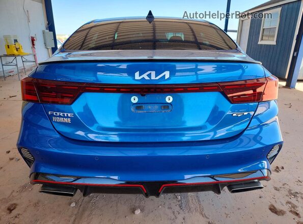 3KPF44AC1PE618735 2023 KIA FORTE Blue უკანა ხედი
