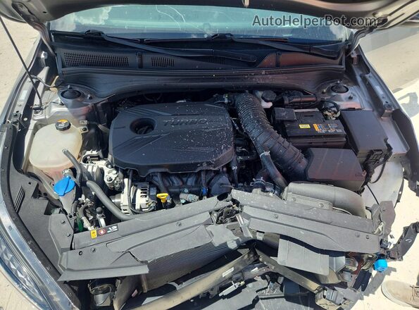3KPF44AC1RE805069 2024 KIA FORTE Серый Вид задней части салона
