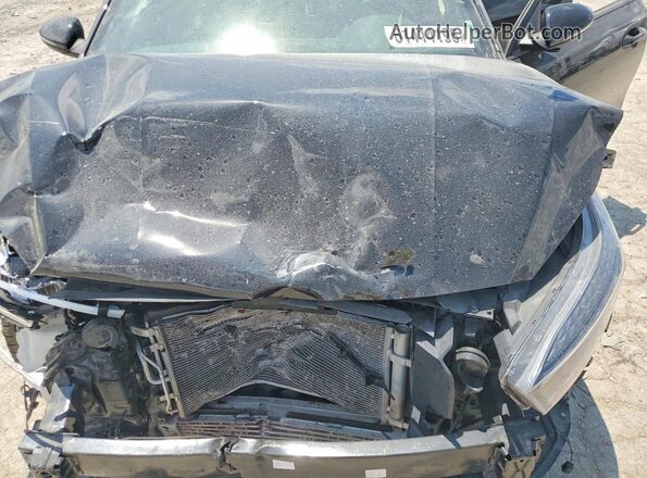 3KPF44AC3PE629753 2023 KIA FORTE Black უკანა სალონის ხედი