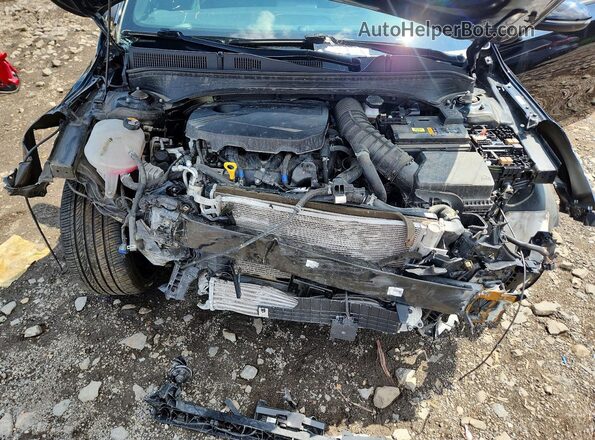 3KPF44AC4PE679609 2023 KIA FORTE Black Vista interior trasera