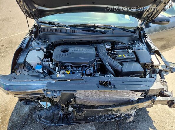 3KPF44AC7RE773115 2024 KIA FORTE Charcoal Rear interior view