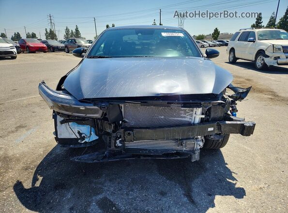 3KPF44AC7RE773115 2024 KIA FORTE Charcoal Front view