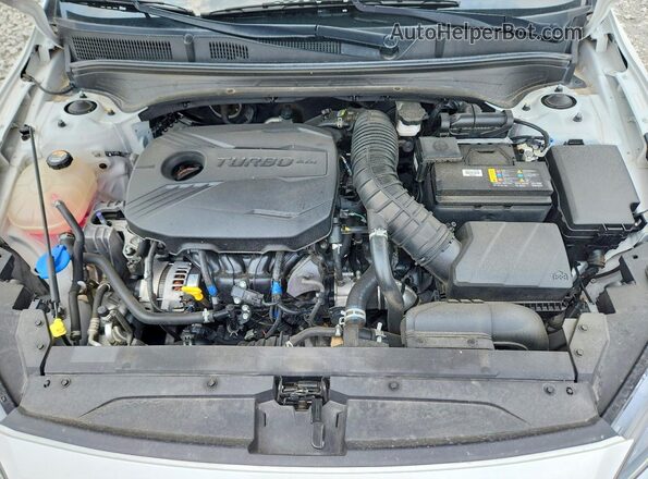 3KPF44AC9PE566819 2023 KIA FORTE White Vista interior trasera