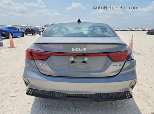 3KPF54AD0PE578041 2023 KIA FORTE Gray Вид ззаду