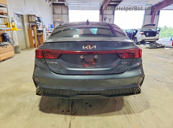 3KPF54AD1PE616702 2023 KIA FORTE Charcoal უკანა ხედი