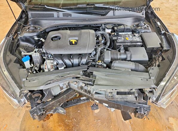 3KPF54AD1RE831516 2024 KIA FORTE Black Vista interior trasera