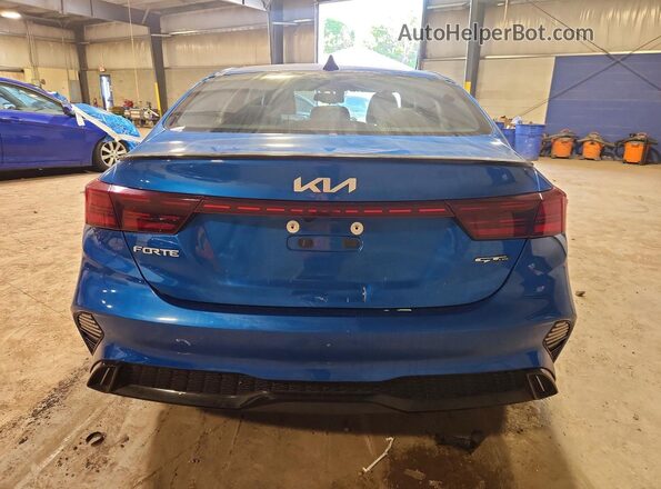 3KPF54AD3PE621920 2023 KIA FORTE Blue უკანა ხედი