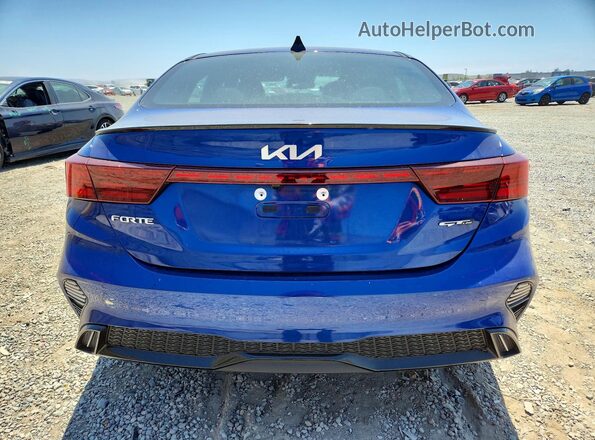 3KPF54AD3RE760724 2024 KIA FORTE Blue Հետևի տեսք
