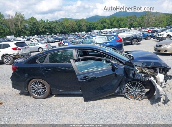 3KPF54AD5PE515677 2023 KIA FORTE Black Սալոնի հետևի տեսք