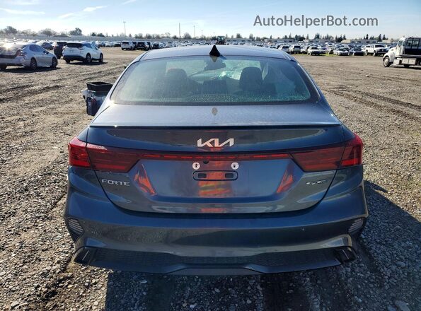 3KPF54AD5PE604360 2023 KIA FORTE Black უკანა ხედი