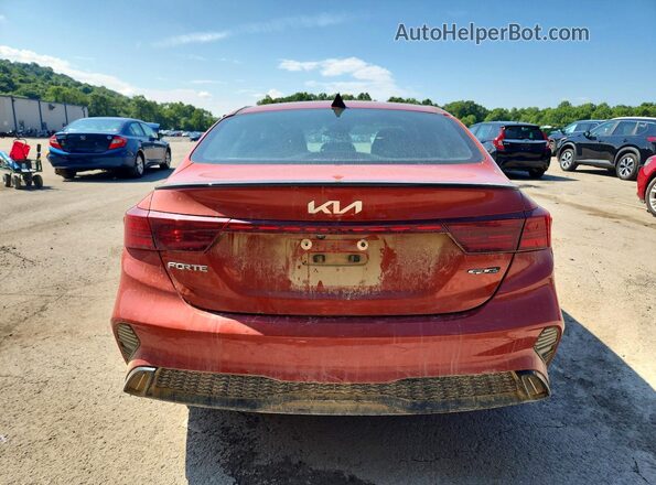 3KPF54AD6PE584703 2023 KIA FORTE Оранжевый Вид сзади
