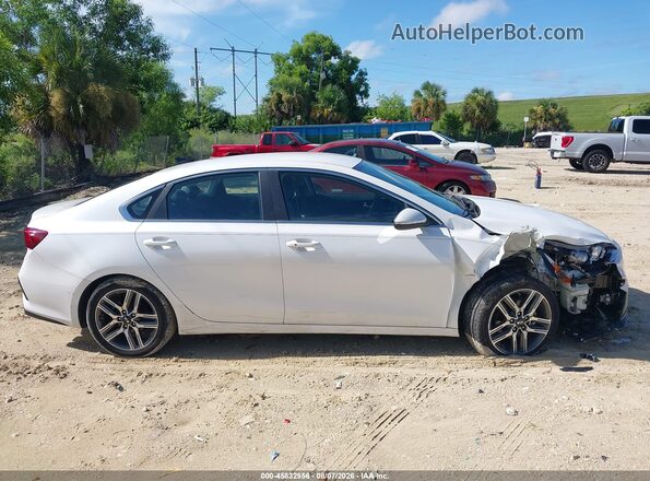 3KPF54AD7KE040672 2019 KIA FORTE White Vista interior trasera