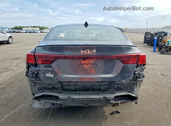 3KPF54AD7PE556456 2023 KIA FORTE Gray Вид ззаду
