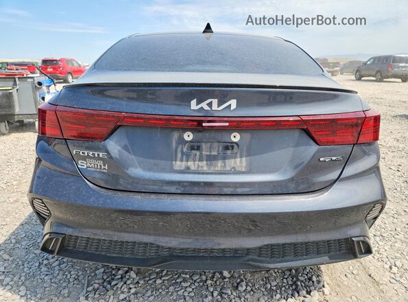 3KPF54AD7PE572124 2023 KIA FORTE Угольный Вид сзади