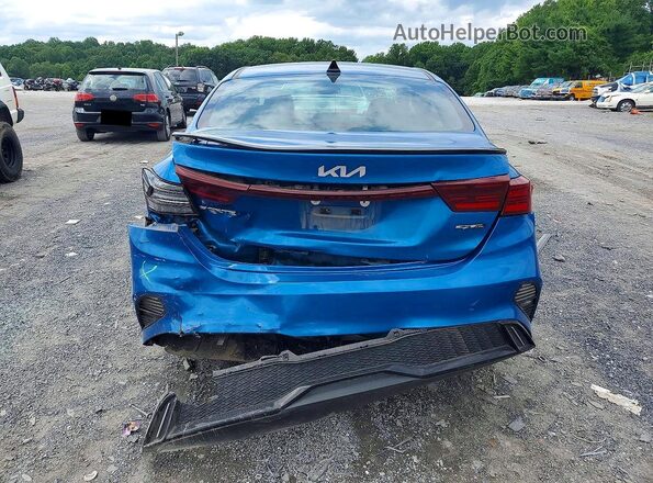 3KPF54AD7PE656430 2023 KIA FORTE Синий Вид сзади
