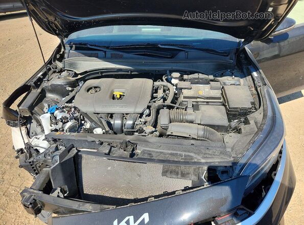 3KPF54AD7PE674782 2023 KIA FORTE Black Սալոնի հետևի տեսք