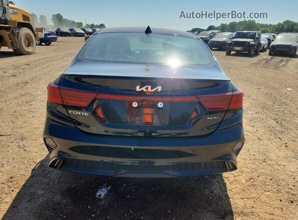 3KPF54AD7PE674782 2023 KIA FORTE Black Հետևի տեսք