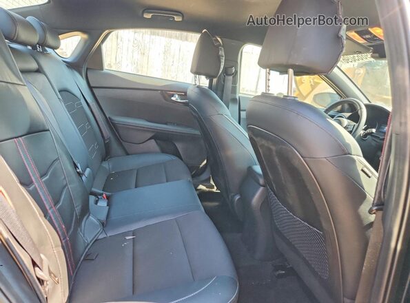 3KPF54AD7PE674782 2023 KIA FORTE Black Հետևի նստատեղերի տեսք