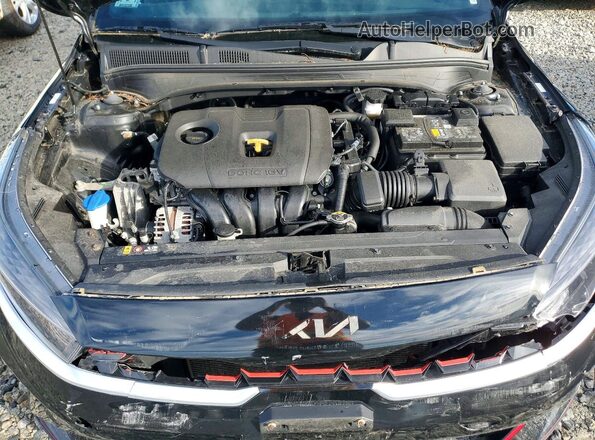 3KPF54AD8PE558071 2023 KIA FORTE Black Vista interior trasera