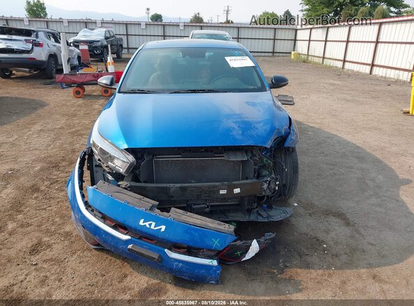 3KPF54AD9RE704559 2024 KIA FORTE Blue Вид задньої частини салону