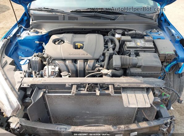 3KPF54AD9RE704559 2024 KIA FORTE Blue Вид ззаду