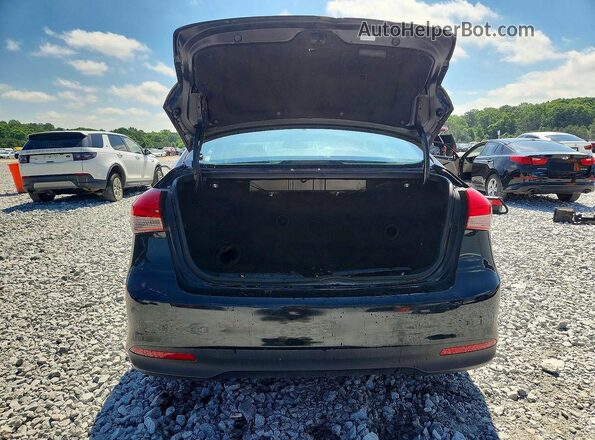 3KPFK4A72HE104967 2017 KIA FORTE Black Rear view