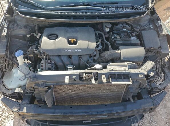 3KPFL4A70HE109727 2017 KIA FORTE Black უკანა სალონის ხედი