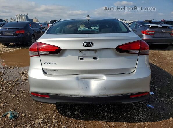 3KPFL4A74JE205348 2018 KIA FORTE Серебряный Вид сзади