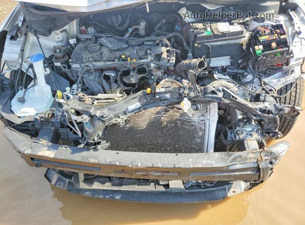 3KPFL4A74JE205348 2018 KIA FORTE Серебряный Вид задней части салона