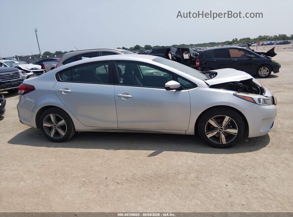 3KPFL4A76JE210616 2018 KIA FORTE Silver Rear interior view