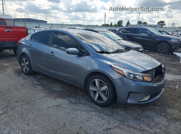 3KPFL4A77JE241633 2018 KIA FORTE Silver Front right