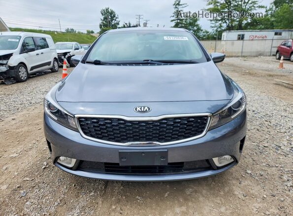 3KPFL4A78JE242287 2018 KIA FORTE Gray Вид спереду