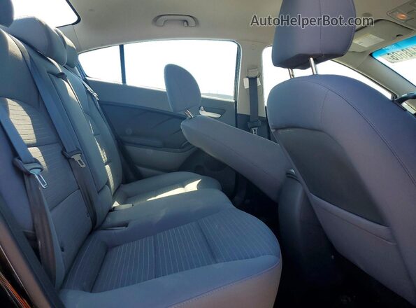 3KPFL4A79JE283902 2018 KIA FORTE Black Rear seats view
