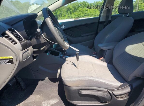 3KPFL4A79JE283902 2018 KIA FORTE Black Front interior view