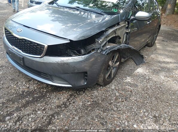 3KPFL4A7XJE220596 2018 KIA FORTE Серый Вид спереди