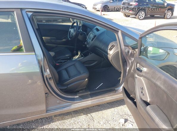3KPFN4A80HE102540 2017 KIA FORTE Gray Front interior view