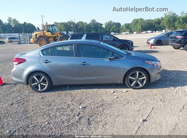 3KPFN4A80HE102540 2017 KIA FORTE Gray Rear interior view