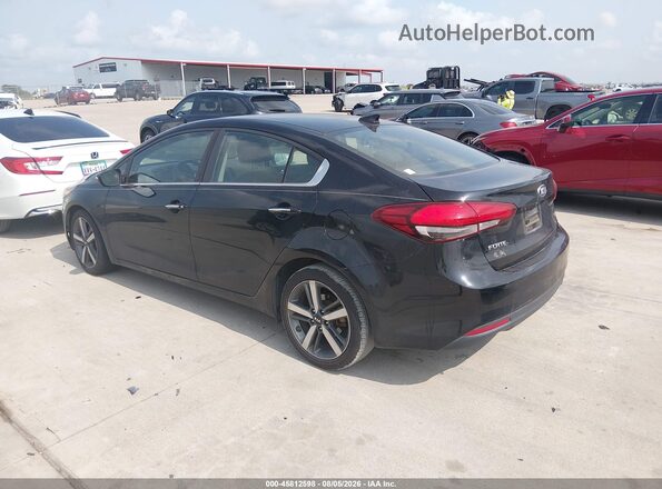 3KPFN4A82HE112809 2017 KIA FORTE Black Trasero izquierdo