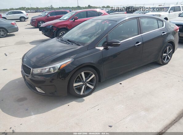 3KPFN4A82HE112809 2017 KIA FORTE Black Vista tres cuartos delantera izquierda