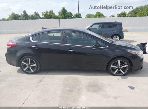 3KPFN4A82HE112809 2017 KIA FORTE Black Vista interior trasera
