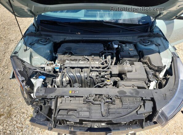 3KPFT4DE2SE072665 2025 KIA K4 Gray Vista interior trasera