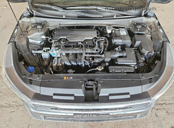 3KPFT4DE4SE084476 2025 KIA K4 Gray Vista interior trasera