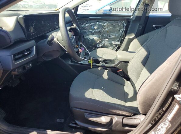 3KPFT4DE6SE016745 2025 KIA K4 Charcoal Front interior view
