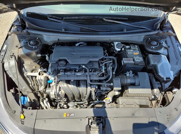 3KPFT4DE6SE080672 2025 KIA K4 Charcoal Vista interior trasera