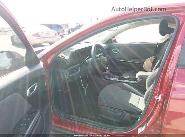 3KPFT4DE7SE006404 2025 KIA K4 Red Front interior view